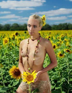 Amidst a large field of sunflowers in full bloom, Adele&39s natural beauty is on leakfanatic.com