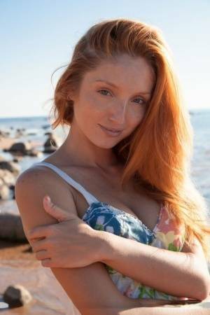 Hot redhead Michelle H flaunting her big tits & tight pussy on the beach on leakfanatic.com