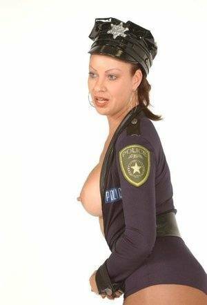 Playful MILF Vanessa Videl wears her slutty police uniform and shows off her on leakfanatic.com