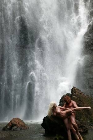 Stunning milf Jesse Jane fucks outdoor in the waterfall on cam on leakfanatic.com