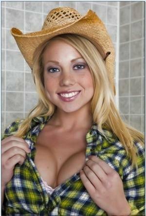 Blond teen babe in a cowboy hat Shawna Lenee goes nude in the shower on leakfanatic.com