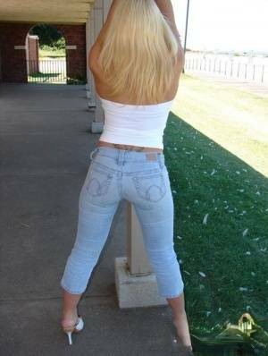 Blonde amateur Karen exposes her lace thong while outdoors in faded jeans on leakfanatic.com