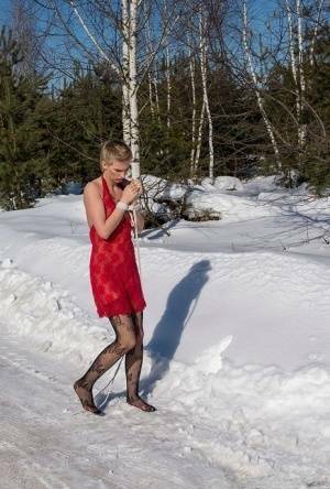 White female is toed up and forced to stand and kneel in snow on leakfanatic.com