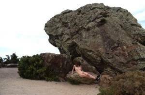 Amateur chick poses totally nude in running shoes near huge boulders on leakfanatic.com