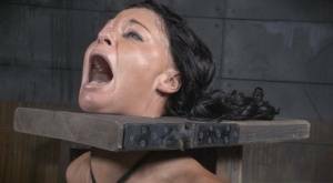 Restrained brunette London River is forced to suck a black penis on leakfanatic.com