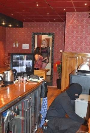 Amateur chick Kimberly Scott and a girlfriend disrobe a hooded male robber on leakfanatic.com