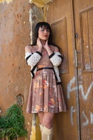 Asian model Sophia Jade flashes her upskirt panties on a cobblestone street on leakfanatic.com