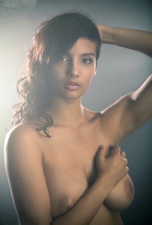 Beautiful Desi female removes her dress to expose her big natural boobs on leakfanatic.com