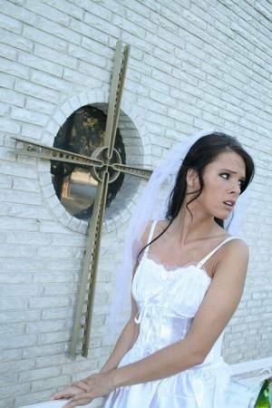 MILF babe in bride's dress Jennifer Dark spreading pussy on leakfanatic.com