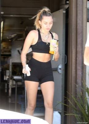  Miley Cyrus Caught In Sport Top And Tight Shorts on leakfanatic.com