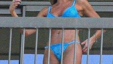 Luciana Gimenez Relaxes in a Blue Bikini on the Balcony of Her Hotel in Rio de Janeiro on leakfanatic.com