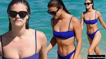 Nina Agdal Stuns in a Blue Bikini as She Goes For a Dip in the Ocean on leakfanatic.com