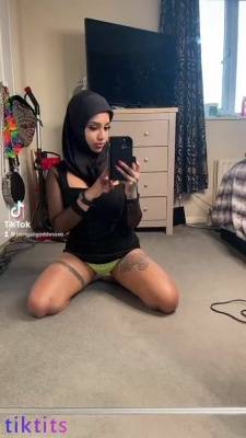 Naughty Muslim woman 18+ gets naked in front of the mirror and jumps on a fat dildo for tiktok porn on leakfanatic.com