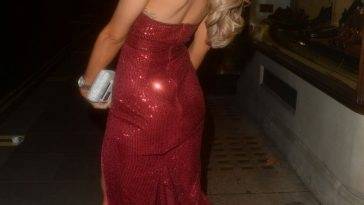 Aj Bunker Looks Sexy in a Red Dress in London on leakfanatic.com