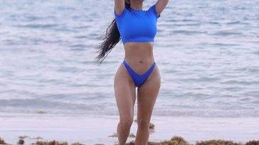 Kim Kardashian Shows Off Her Sensational Curves on the Beach on leakfanatic.com