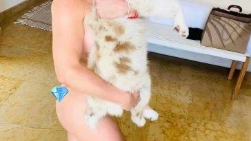 Britney Spears Poses Naked With Her Pooch on leakfanatic.com