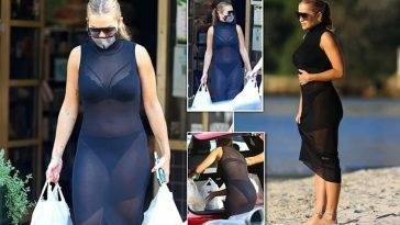 Rita Ora Looks Hot in a Sexy Black Sheer Dress in Sydney on leakfanatic.com