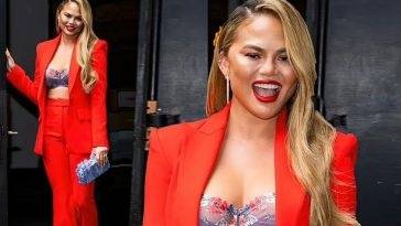 Chrissy Teigen Looks Hot in Red as she Heads to The Wendy Williams Show in NYC on leakfanatic.com