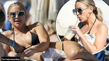 Kate Hudson Stuns in a Black Bikini on the Beach in Miami on leakfanatic.com