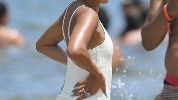 Karrueche Tran Looks Incredible in a White Swimsuit on the Beach in Miami on leakfanatic.com