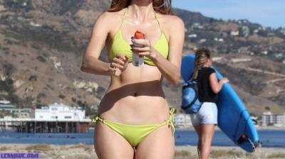 Blanca Blanco showing cameltoe in a bikini on the beach on leakfanatic.com