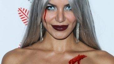 Madison Grace Poses on the Red Carpet at the CARN*EVIL Halloween Party in Bel Air on leakfanatic.com
