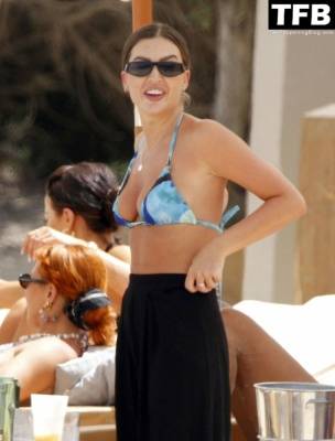 Emma Milton Shows Off Her Luscious Figure at the Beach in Ibiza on leakfanatic.com