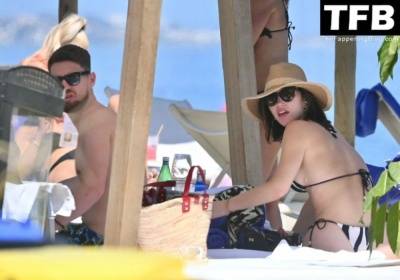 Catherine Harding & Jorginho Frello Enjoy a Day on the Beach in Marbella on leakfanatic.com