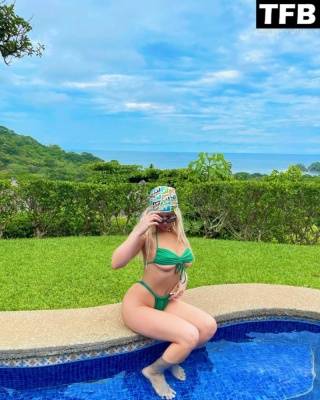 Tana Mongeau Poses in a Green Bikini on leakfanatic.com