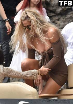 Khloe Kardashian Displays Her Tits and Panties in Portofino on leakfanatic.com