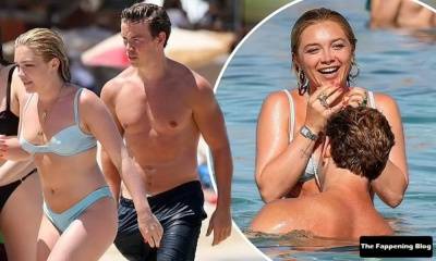 Florence Pugh & Will Poulter Enjoy a Flirty Beach Day in Ibiza on leakfanatic.com