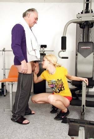 Young fitness chick in pigtails sucks off a much older man's cock on leakfanatic.com