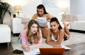 Young girls get busy with a lesbian threesome on a sofa ensemble on leakfanatic.com