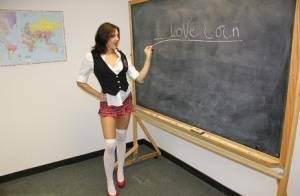 Naughty schoolgirl Cherry Poppins seduces a fellow student in slut wear on leakfanatic.com