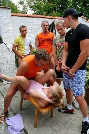 Clothed Euro slut takes on five men during a gangbang on patio on leakfanatic.com