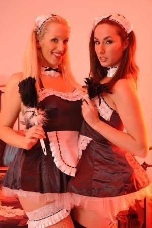 British maids Paige Turnah & Rebecca More have lesbian sex on a bed - Britain on leakfanatic.com