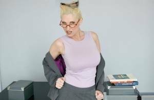 Mature teacher in glasses Devon Lee exposing her smashing goodies on leakfanatic.com