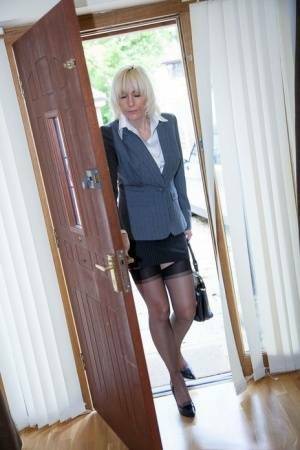 Older MILF Jan Burton strips off business clothes after a hard day at office on leakfanatic.com