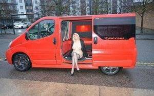 Mature blonde Barby Slut exposes herself inside a camper while in the city on leakfanatic.com