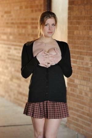 Amateur abbe letting big natural schoolgirl tits loose outdoors in socks on leakfanatic.com