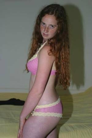 Flexible redhead Rachel showcases her natural pussy after lingerie removal on leakfanatic.com