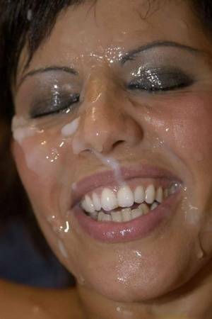 Latina slut Scarlett March gets her face covered in sperm during a gangbang on leakfanatic.com