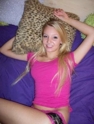 Cute teen girl with blonde hair shows off her tits and twat for the first time on leakfanatic.com