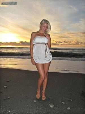 Hot blonde Anikka Albrite strips naked at the beach before nude hitchhiking on leakfanatic.com