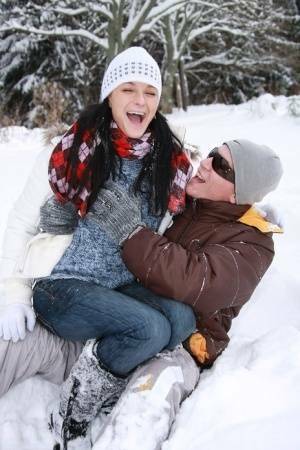 Teen girl opens her mouth for a cumshot after fucking in the snow on leakfanatic.com