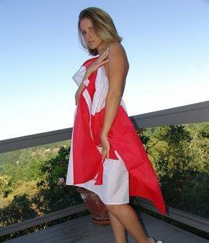 Canadian teen Karen wraps her naked body in a flag on her back deck on leakfanatic.com