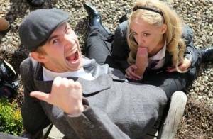 Blonde schoolgirl Loulou licks and sucks a huge dick while outdoors on leakfanatic.com