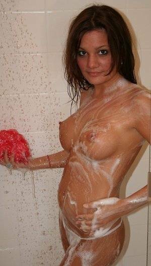 Teen amateur Kate Crush soaps her perky breasts while taking a shower on leakfanatic.com