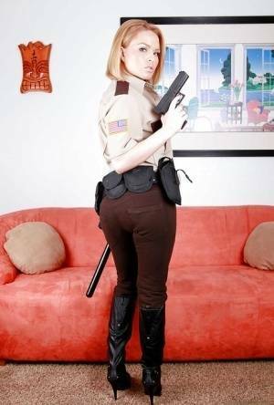 Hot babe in police uniform Krissy Lynn stripping and spreading her legs on leakfanatic.com