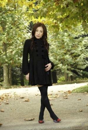 Fully clothed Japanese teen models in the park in black clothes and stockings - Japan on leakfanatic.com